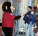 Curious George greets his fans.